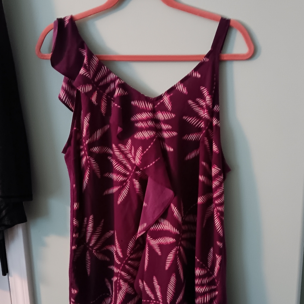 Wine colored tank shirt.